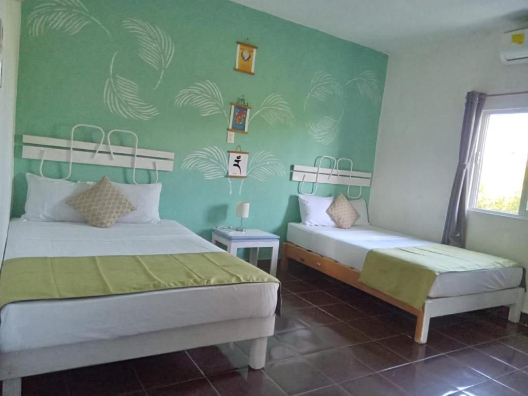 Departamentos Cerca De Ferry Holbox Hotel Buitenkant foto